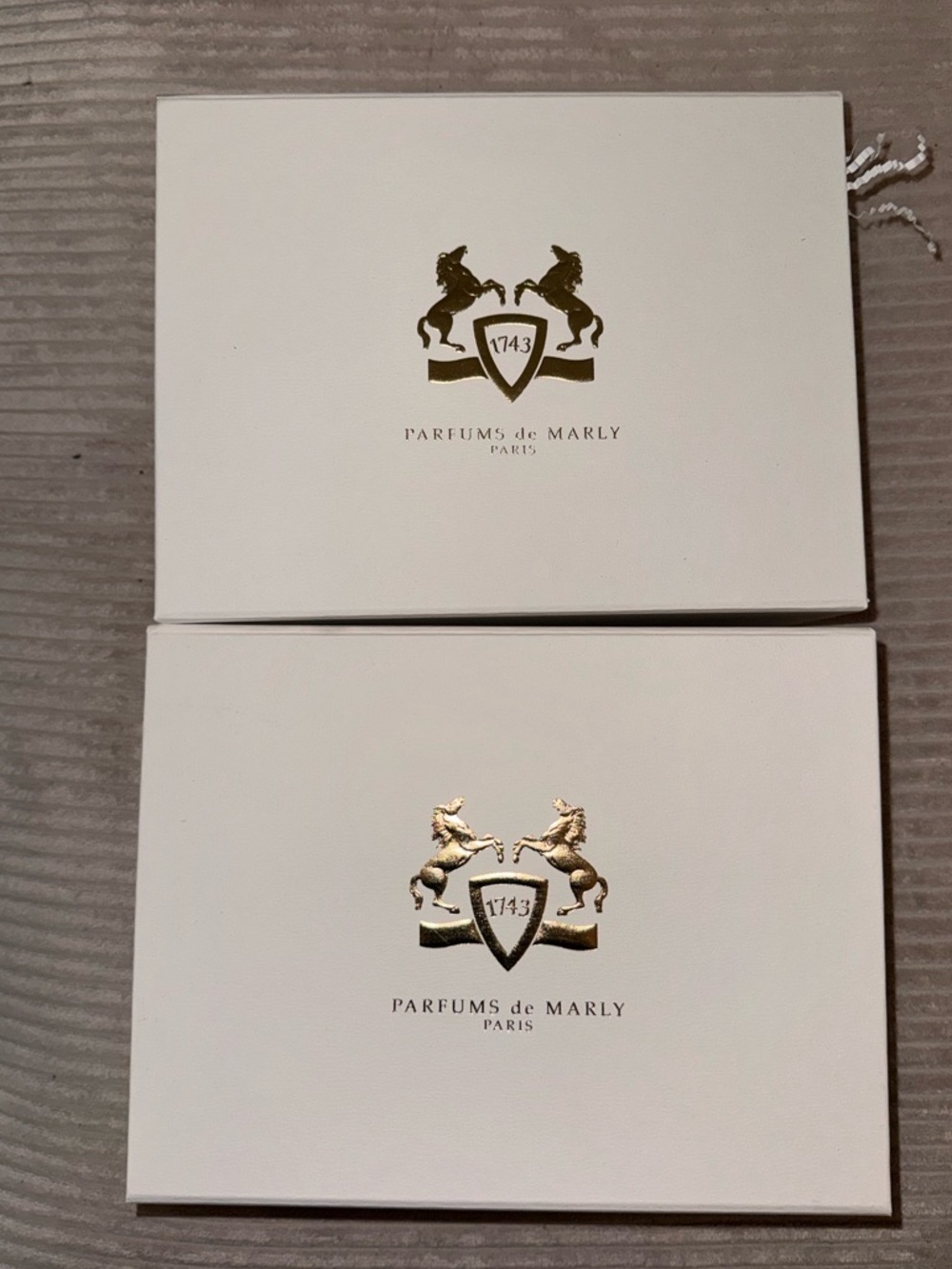 Parfums de Marly White Gift Boxes with Gold Logo